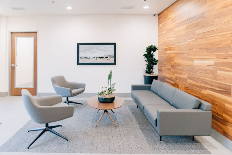 Interior photo of greeting area and open space at Lake Grove Crossing